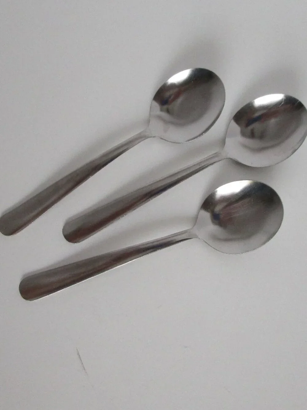 set of stainless steel soup spoons